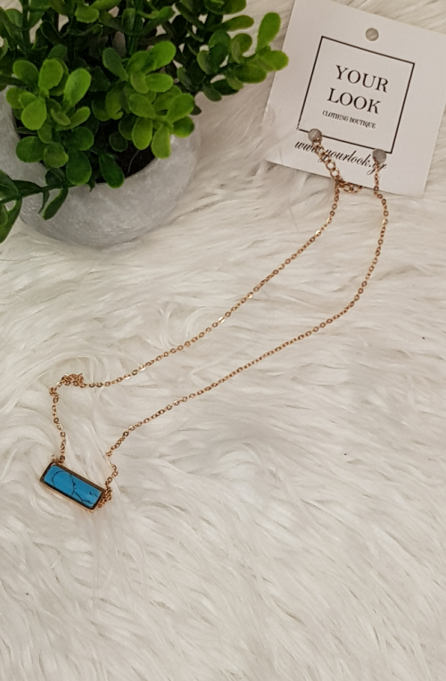 	rose gold necklace with bright green stone	